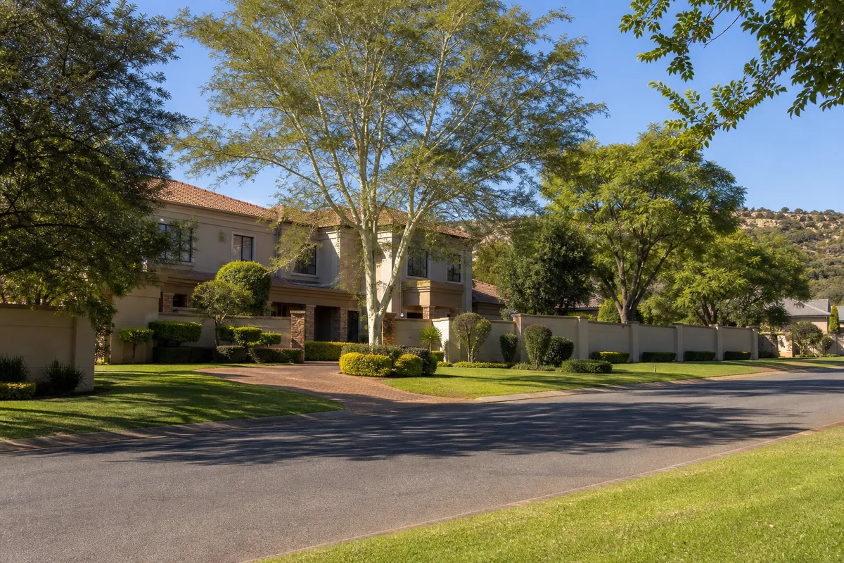 Established suburban homes surrounded by mature greenery in Moreleta Park, within HoneySucker's Pretoria East septic service coverage